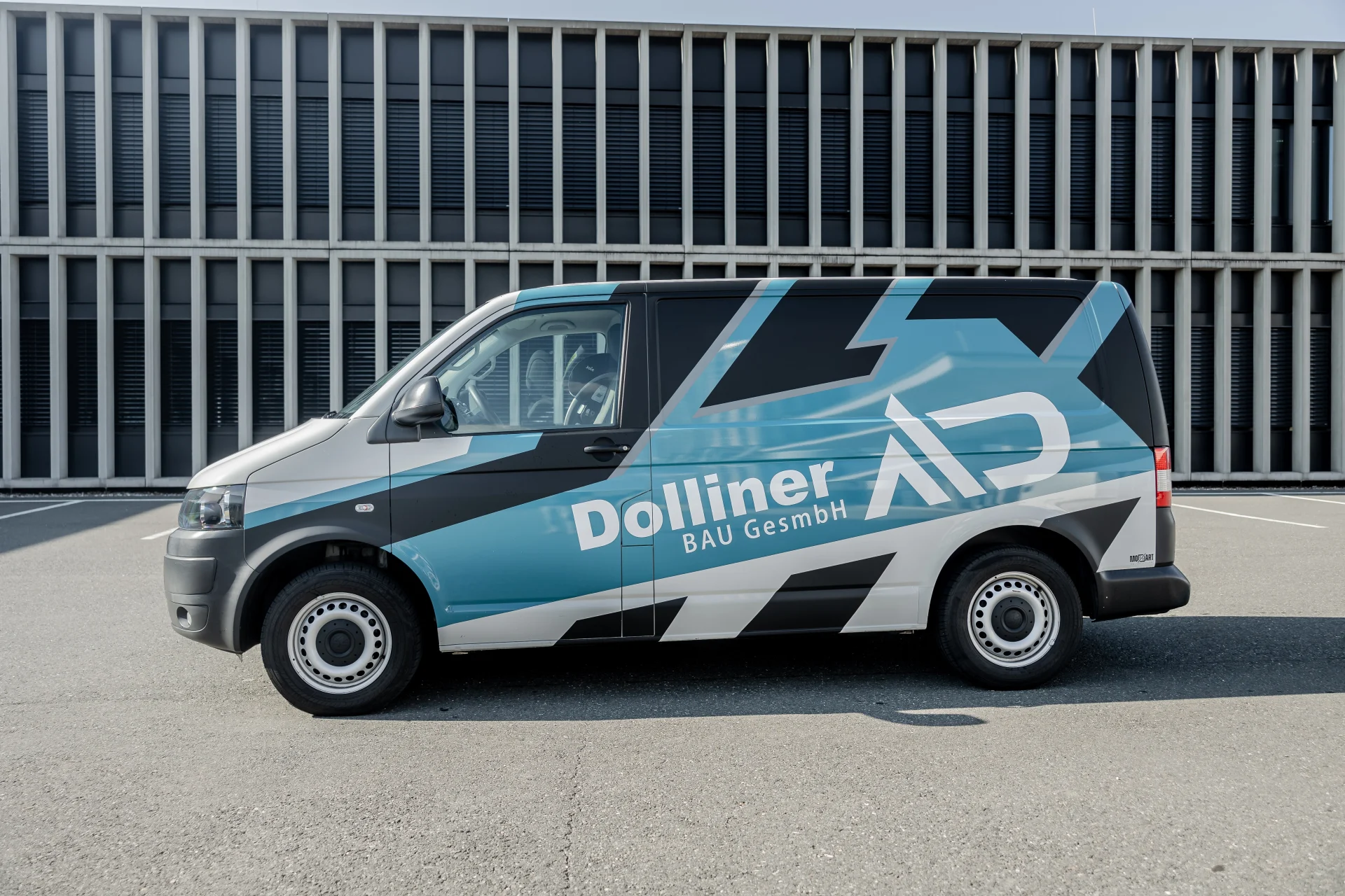 Firmenbeklebung Dolliner Bau VW T5 Transporter