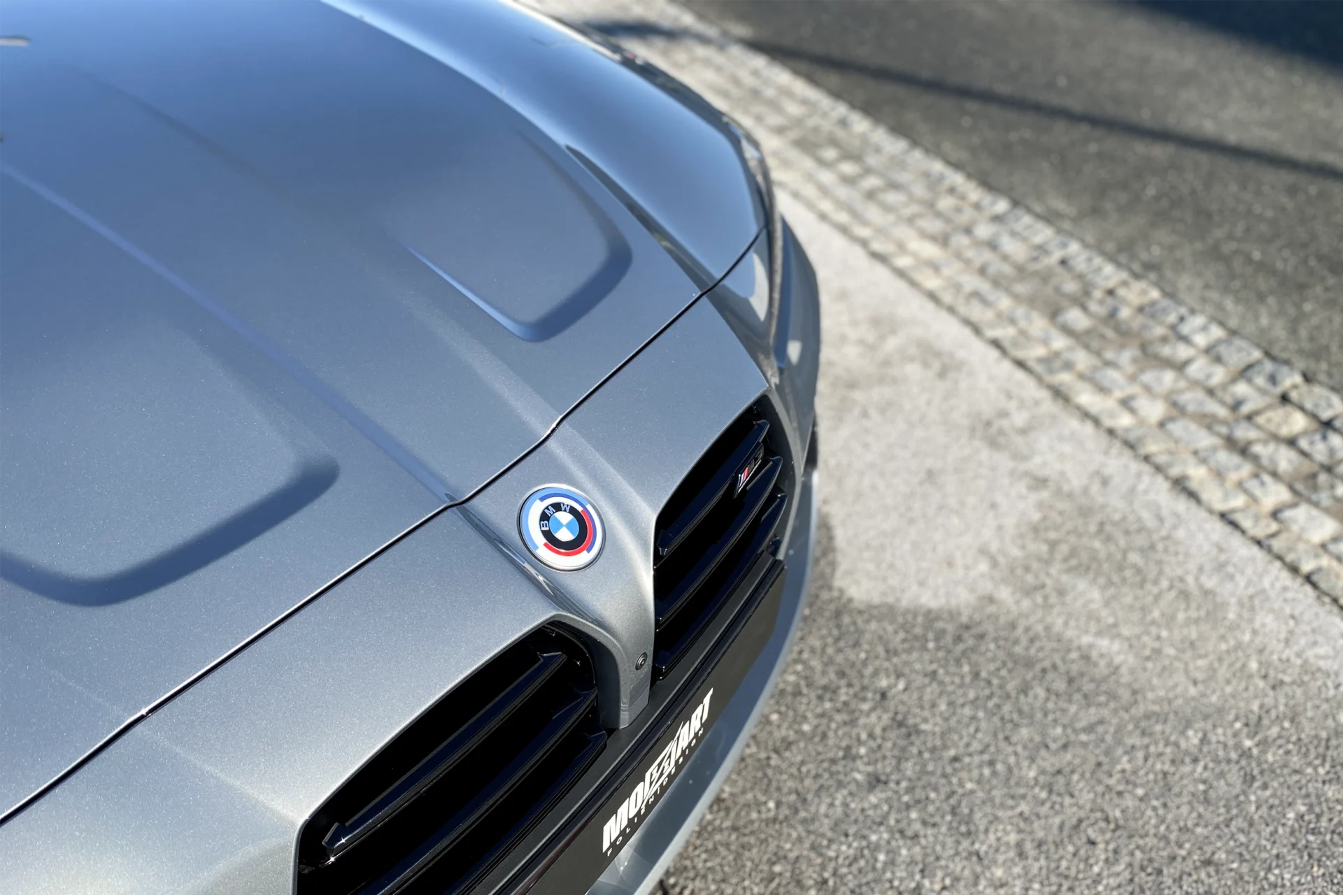 BMW M3 Competition Motorhaube und Stoßstange mit XPEL Lackschutzfolie aus Salzburg geschützt